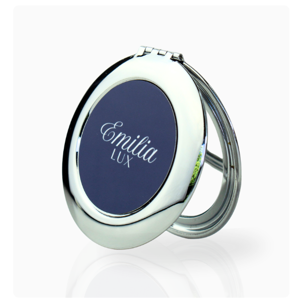 Compact travel mirror designed for quick makeup touch-ups and beauty on the go