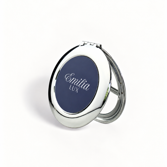 Emilia Lux silver compact mirror with navy logo