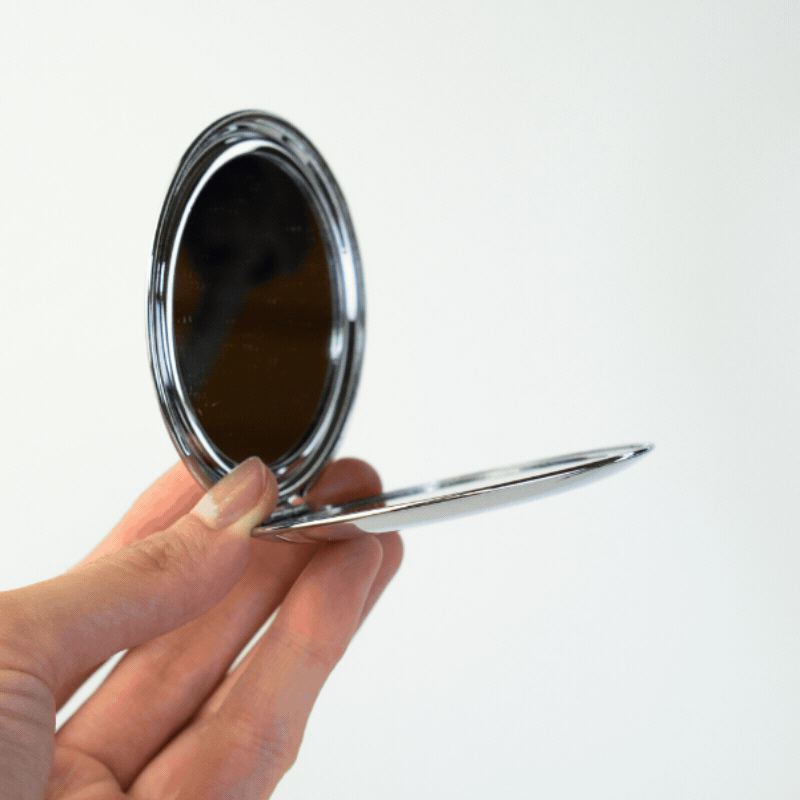 Portable beauty mirror for makeup checks, skincare routines, and daily self-care