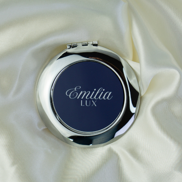 Small travel mirror perfect for purses, cosmetic bags, and quick beauty touch-ups